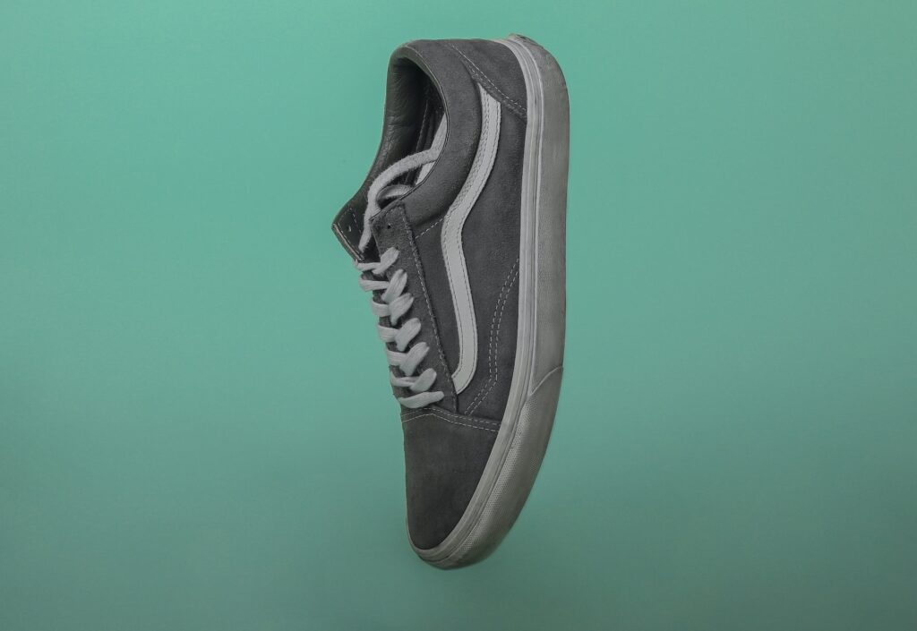 A grey Vans sneaker