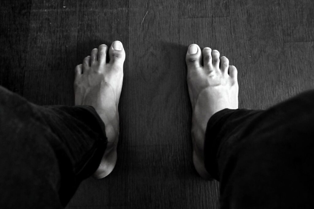 A person standing barefoot